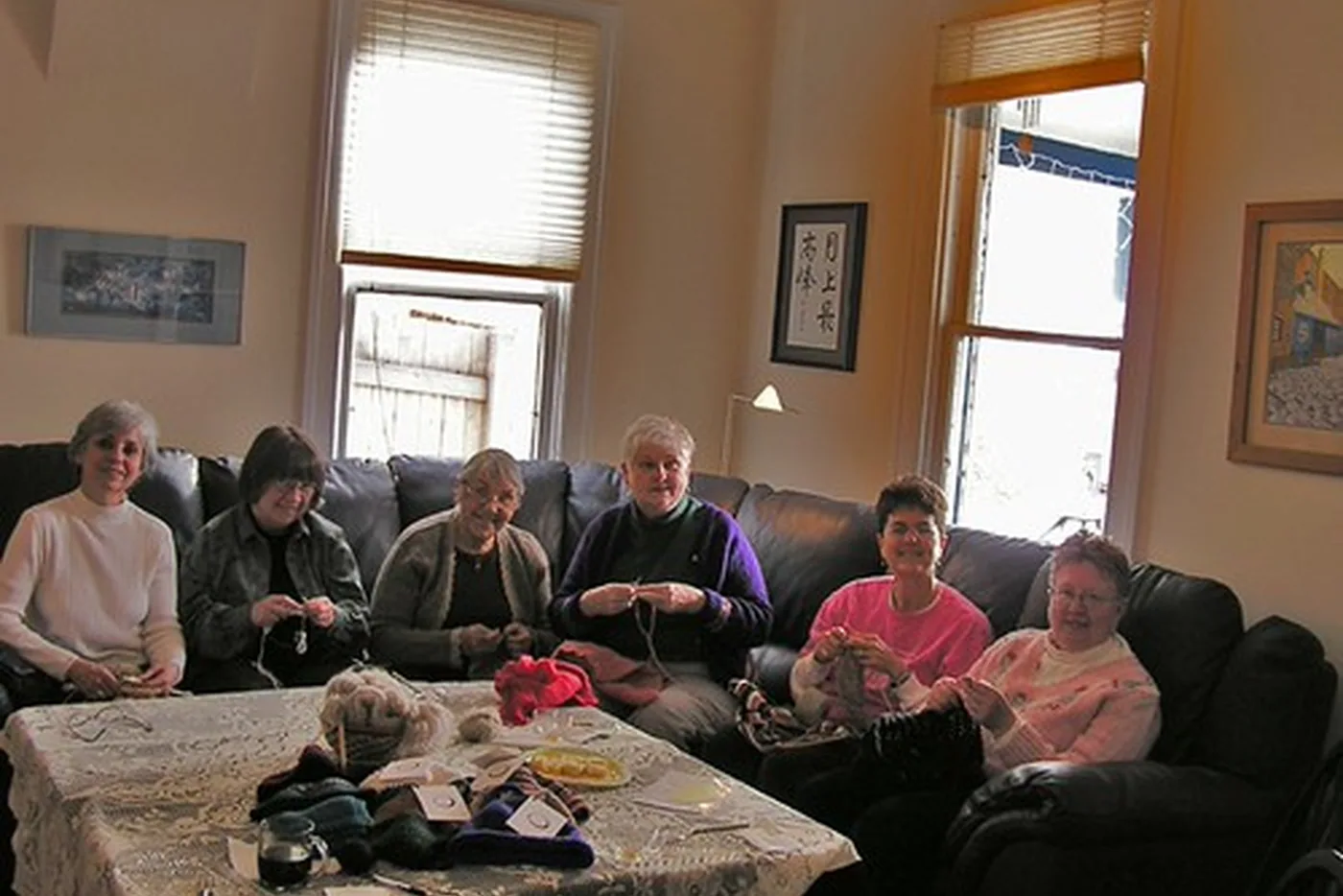 Older people gathered together in a day centre.